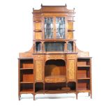 An Edwardian inlaid mahogany chiffonier The high back with urn shaped finials above a dentil