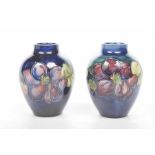 Two Moorcroft "Clematis" pattern vases Each of ovoid form,