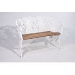 A Coalbrook style garden bench Of typical form with scrolling panelled back reticulated and cast