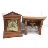 A late 19th Century oak cased bracket clock With a 7" brass dial with pierced spandrels,
