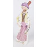 A rare and unusual porcelain 'Votes of Women' decanter Modelled as a Suffragette with removable