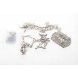 A silver charm bracelet With various charms attached, together with a silver fancy-link chain,