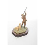 A Border Fine Arts figure group Depicting a man shooting accompanied by two yellow Labrador raised