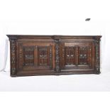 A 17th Century style Flemish oak panel Having two invert moulded linen fold panels flanked by