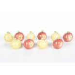 A collection of Meissen style condiments Comprising five lemon and five apple examples each with