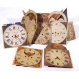 A collection of longcase clock dials To include painted break arch dials and square brass dials,