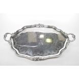 A Victorian style Silver twin handled tray The scalloped oval tray adorned with twin accanthus