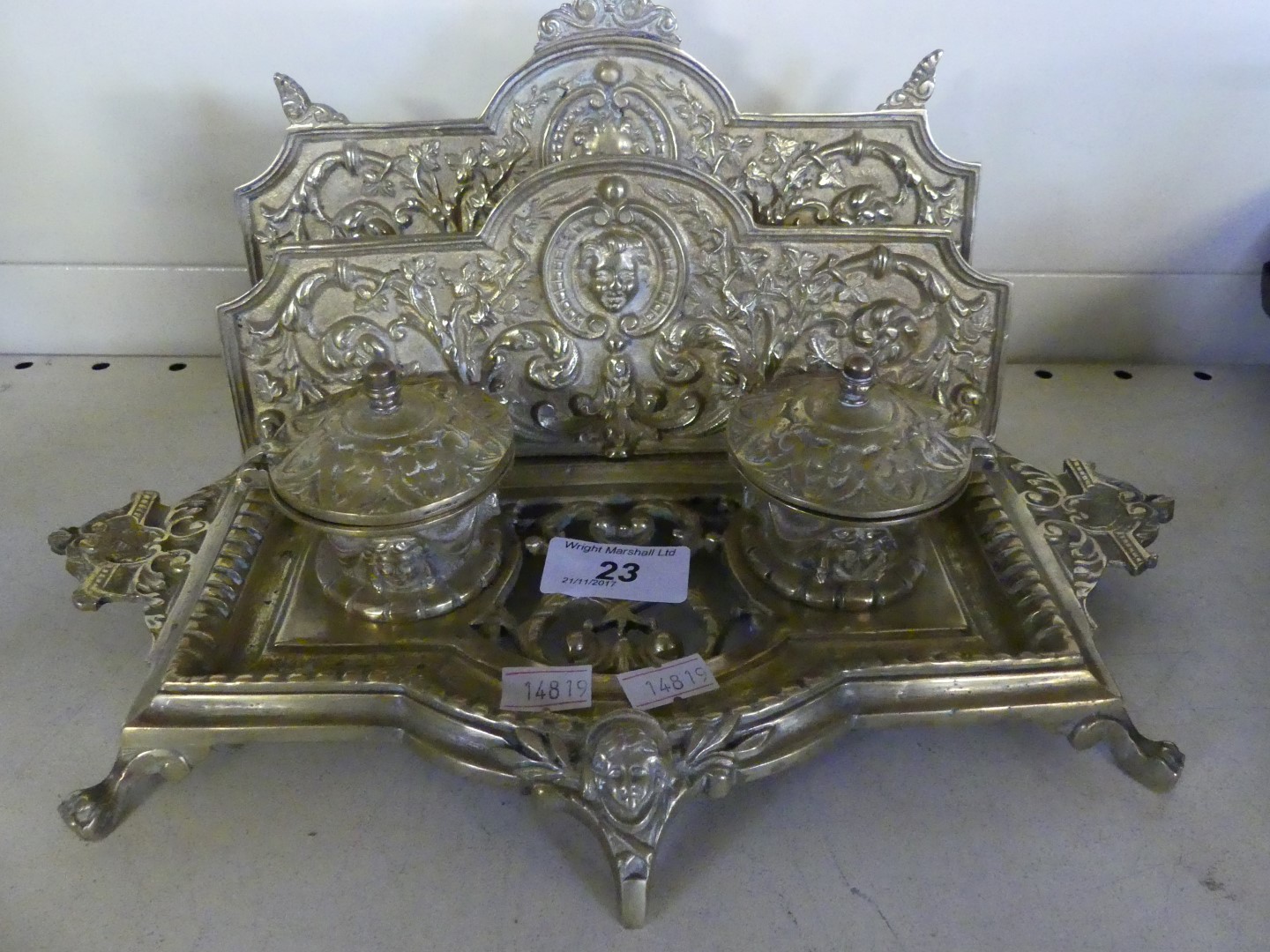 Early 20th Century continental brass desk stand, decorated with foliate scroll,