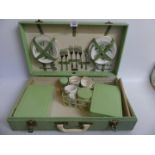 A cased Brexton picnic set, fitted with crockery, cutlery and boxes.
