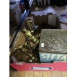 A mixed lot comprising brass firedogs, heavy brass candlestick, cased silver plated fish servers,