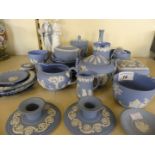 A collection of 20th Century Wedgwood blue Jasperware to include various vases, pin trays, ashtrays,
