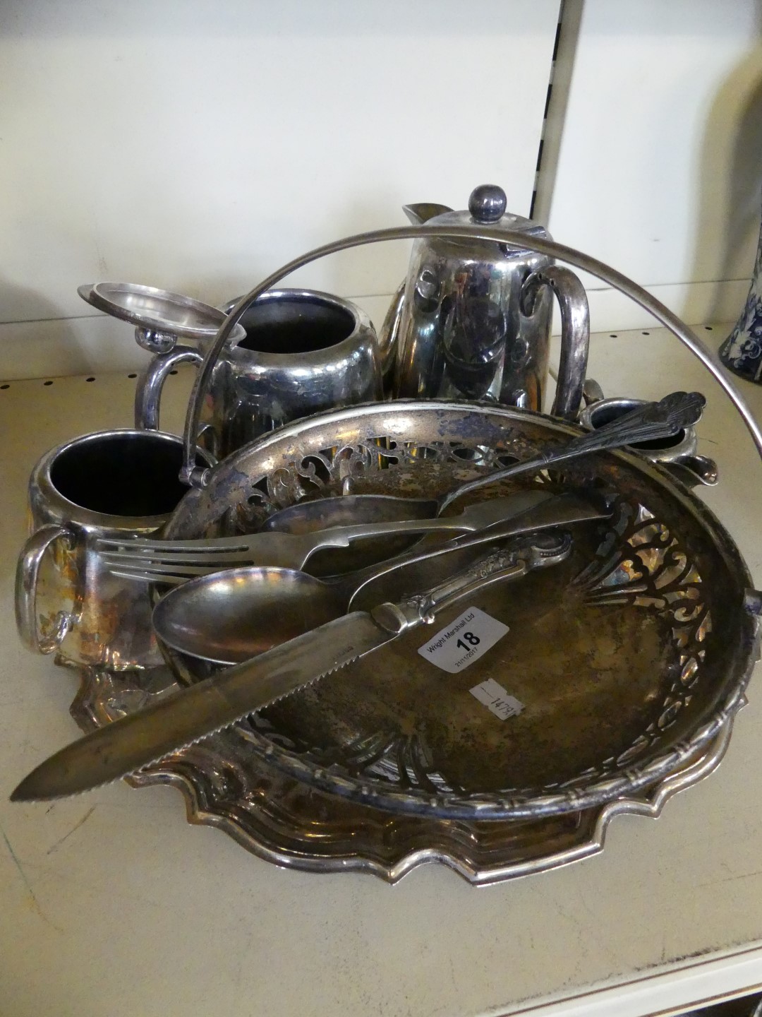 A collection of various silver-plated wares to include pierced table basket, waiter tray,