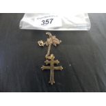 A yellow metal cross pendant and chain, weight approx. 4.