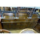 A good quality solid oak Old Charm sideboard,