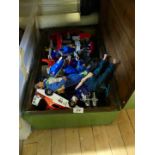 A wooden trunk containing various Action Man and other children's toys,