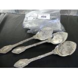 A set of three Victorian silver serving spoons of ornate form, Sheffield hallmarked, weight 3.