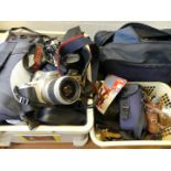 A large collection of various assorted cameras, to include Cannon, Pentax, etc.
