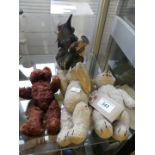 Three small vintage cloth covered teddy with articulated arms and legs,