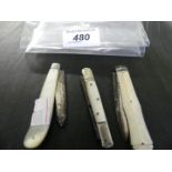 Two silver bladed and mother of pearl handled folding pocket knives,