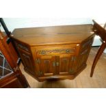 A good quality solid oak Old Charm side table,