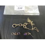 An amethyst and yellow metal suite, comprising a pair of drop earrings,