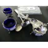 A mixed lot of various hallmarked silver wares comprising three piece cruet, with blue glass liners,