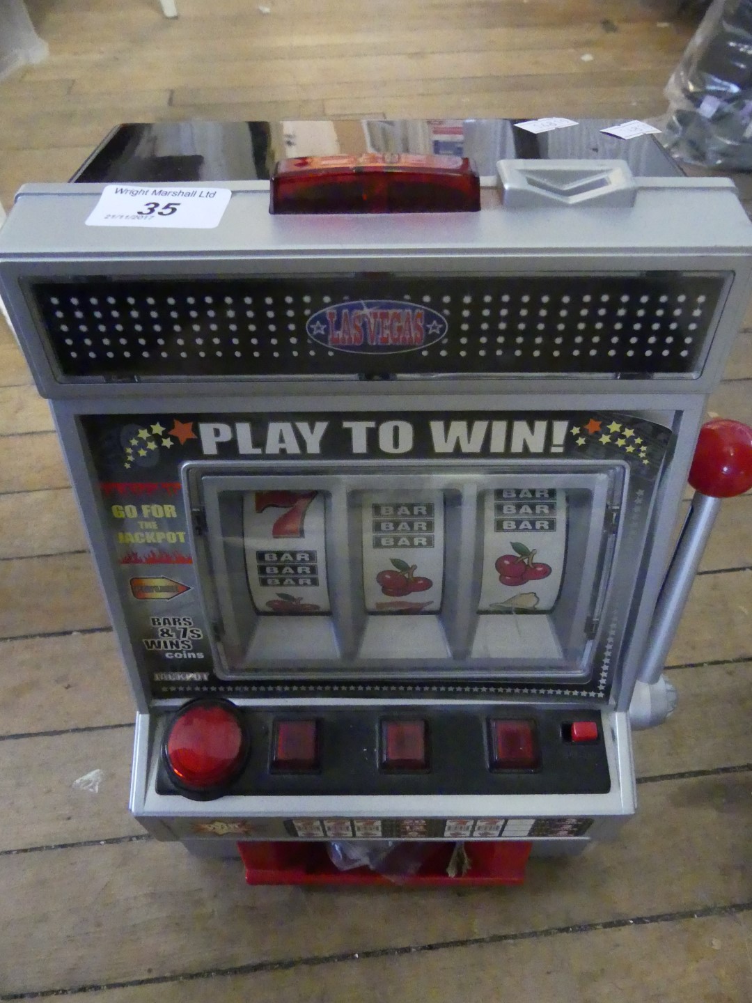 A contemporary Las Vegas battery operated one arm bandit fruit machine,