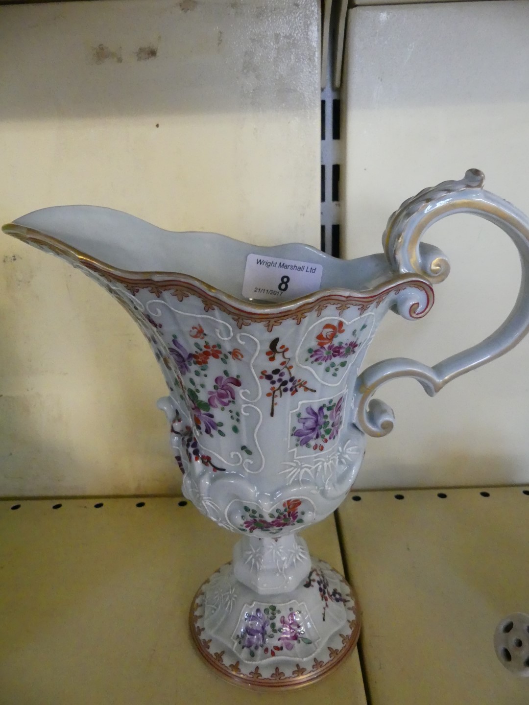 A 19th Century hand painted Sampson porcelain jug in Chinese style.