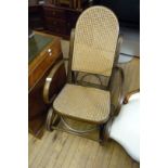 A good quality bentwood cane seated and backed rocking chair.