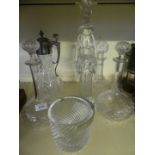 A collection of four various 20th Century cut clear glass decanters,