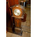 An early 20th Century oak granddaughter clock.