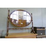 A good quality reproduction yew wood dressing table mirror.