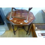 An early 20th Century inlaid hardwood octagonal topped occasional table.