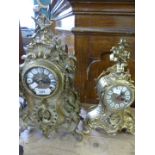 Two early 20th Century brass cased roccoco style mantel clocks, largest 42cm,