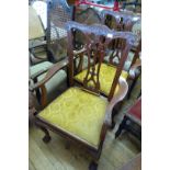 A 18th Century medium oak hall chair together with two Chippendale style carver chairs.