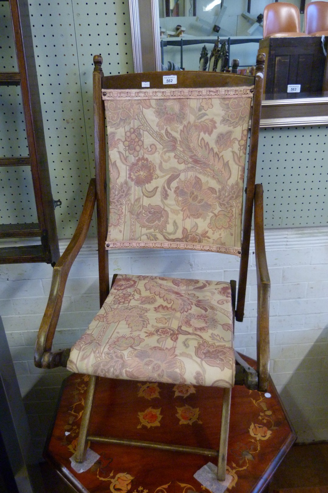A mid Century hardwood folding campaign chair.