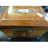 A late 19th/early 20th Century oak and metal mounted tea caddy with two interior sections.