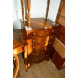 A good quality Bevan Funnel Reprodux serpentine fronted narrow chest of drawers.