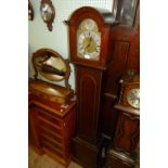 An Edwardian mahogany cased tempus fugit granddaughter clock.