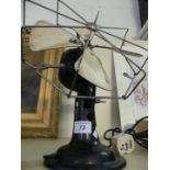 A vintage electric desk fan,
