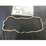 A 9k gold tri-colour chain necklace, approx weight 10g.