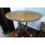 A Victorian burr walnut veneered loo table.