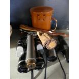 A collection of binoculars to include Tohyoh, Optus, a small brass telescope and a further tripod.