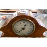 A small Edwardian mantel clock in mahogany and inlaid case.