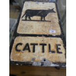 A vintage cast aluminium cattle road sign