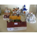 A mixed lot comprising ten various model buildings,