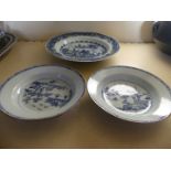 A pair of 19th Century Chinese blue and white circular dishes together with a further blue and