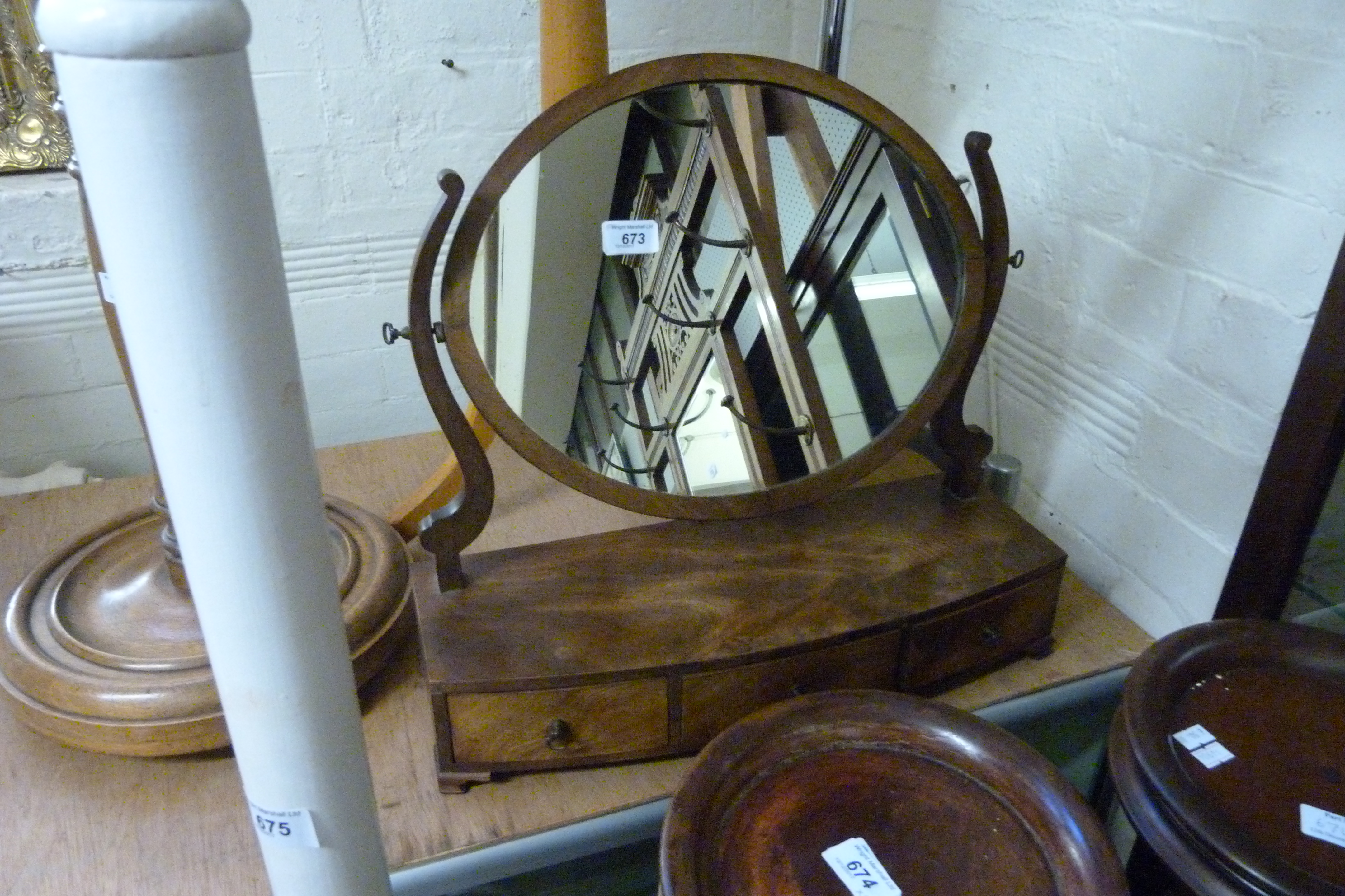A 19th Century mahogany dressing table mirror, having three base drawers.