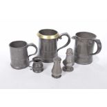 A collection of late 19th Century pewter To include a quart tankard with inscribed detailing,