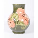 A Walter Moorcroft "Coral Hibiscus" vase Of ovoid form,
